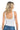SaltTree ANWND white sleeveless ribbed tank bodysuit with a deep scoop back worn by a blonde model with denim jeans