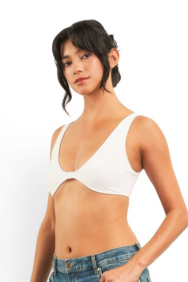 SaltTree ANWND white scoop neck bralette with front hook closure and wide straps worn by a model