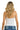 SaltTree ANWND white seamless cami top with spaghetti straps worn by a blonde model, back view.
