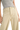 SaltTree high-rise wide-leg crop pants in beige stretch twill with a button fly, worn with a grey ribbed top.