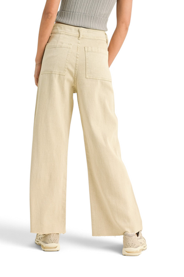 SaltTree Miou Muse high rise wide leg crop pants in beige stretch twill with a raw hem, viewed from the back.