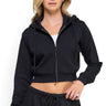 Model wearing a black SaltTree cropped zip-up hoodie in lightweight stretch terry with a drawstring hood.