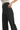 SaltTree high-rise black wide-leg crop pants in soft stretch twill with a button fly, worn by a model.
