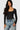 SaltTree Love Poem black long sleeve scoop neck bodysuit worn by a model with blue jeans