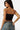 SaltTree model wearing a black Love Poem double-layered strapless tube top with a smoothing second-skin fit