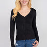 SaltTree model wearing a black Active Basic V-neck button-front cardigan in junior sizing with long sleeves.