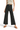 SaltTree high-rise black wide-leg crop pants with a raw hem, worn by a model with a beige top and brown sandals.