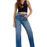 SaltTree model wearing Cello Jeans super high rise medium wash dad jeans with a straight leg and 31-inch inseam
