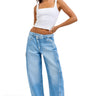 SaltTree model wearing Cello Jeans light wash mid-rise barrel leg denim with an asymmetric front closure