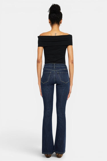 SaltTree dark wash high rise bootcut stretch jeans with 33" inseam and 18" leg opening. Model is 5'9" wearing size 5/26.