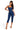 Model wearing a SaltTree DIOSA dark wash denim corset jumpsuit with a sweetheart neckline and skinny capri legs.