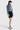 SaltTree model wearing an Enjean stone wash cropped denim jacket with a point collar and button-front closure.