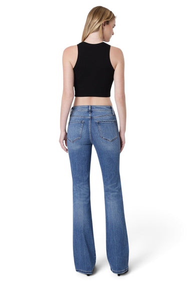 SaltTree model wearing Flying Monkey high rise medium blue bootcut jeans with a raw hem, viewed from the back.