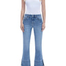 SaltTree model wearing Flying Monkey high rise medium wash kick flare jeans with a distinctive trouser slit hem.