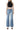 SaltTree Flying Monkey high rise vintage flare jeans in medium wash with slant side seams and distressed raw hem.