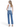 SaltTree model wearing Flying Monkey high rise ankle straight jeans in medium blue wash with distressed back hem