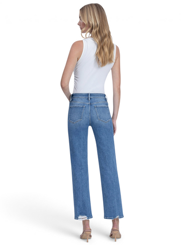 SaltTree model wearing Flying Monkey high rise ankle straight jeans in medium blue wash with distressed back hem