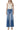 SaltTree model wearing Flying Monkey high rise wide leg trouser jeans in medium wash with a front crease