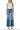 SaltTree model wearing Flying Monkey high rise wide leg trouser jeans in medium wash with a front crease