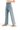 SaltTree high rise wide leg crop pants in light wash stretch twill with a raw hem, worn with sandals.