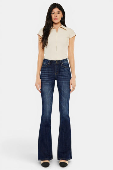 SaltTree Kancan mid-rise dark stone wash flare jeans with a 33.75" inseam, made from stretch denim.
