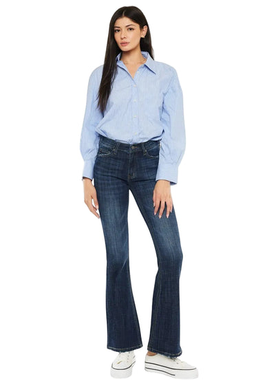SaltTree Kancan mid-rise flare petite jeans in dark wash denim with whiskering and contrast stitching.