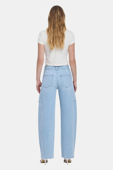 SaltTree light wash denim barrel leg jeans with a super high rise and full length finished hem, worn by a model.