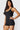 SaltTree Love Poem black airbrush onesie romper with a scoop neck and sculpting second-skin fit on a model