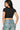 SaltTree Love Poem black cropped crew neck t-shirt with double-layer contour fabric worn by a model from the back.