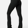 SaltTree Love Poem black high-rise kick-flare leggings with a curved shaping waistband worn by a model