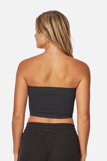SaltTree Love Poem black ribbed seamless tube top worn by a model, back view showing fitted strapless design.
