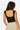 SaltTree Love Poem black seamless cap sleeve tank top with a deep scoop back worn by a model