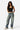 Model wearing SaltTree Love Poem black double-layered scoop neck tank top with blue jeans on a white background