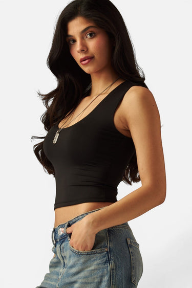 SaltTree Love Poem black double-layered scoop neck tank top worn by a model in a fitted second-skin style.
