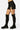 SaltTree Love Poem black scuba knit high-waisted mini skort with side slit worn with black over-the-knee boots