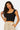 Model wearing SaltTree Love Poem black seamless cap sleeve tank top with a scoop neckline and fitted silhouette