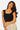 SaltTree Love Poem black seamless cap sleeve tank top with a scoop neckline worn by a model