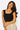 SaltTree Love Poem black seamless cap sleeve tank top with a scoop neckline worn by a model