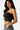 SaltTree Love Poem black strapless tube top in smoothing double-layer contour fabric worn by a model