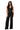 SaltTree Love Poem black waffle-knit two-piece set with button-front vest and high-waisted wide-leg trousers on model