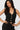 SaltTree Love Poem black waffle-knit button-front vest with gold buttons worn by a model