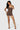 SaltTree Love Poem brown airbrush onesie romper with a scoop neck and sculpting second-skin fit on a female model.