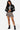 SaltTree Love Poem black faux leather cropped moto jacket with white racing stripes and high snap collar on a model