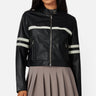 SaltTree Love Poem black faux leather cropped moto jacket with white racing stripes and high snap collar on a model