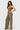 SaltTree Love Poem green waffle-knit two-piece set with a button-front vest and high-waisted wide-leg trousers.