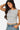 SaltTree Love Poem white sleeveless boatneck top in smoothing double-layer jersey fabric worn by a model