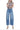 SaltTree medium wash high rise barrel leg jeans with a 1" cuff in a cotton-lyocell blend.