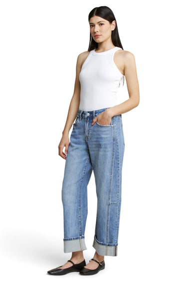 SaltTree model wearing Mica Denim high-rise barrel-leg jeans in vintage medium wash with a cuffed hem.