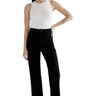 SaltTree Mica Denim high-rise slim wide-leg black jeans with a raw hem worn by a model in a white tank top