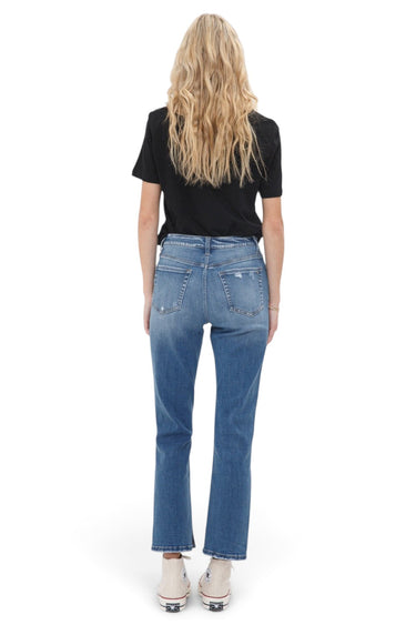 SaltTree Mica Denim high-rise straight jeans in vintage medium blue with back pockets and raw hem, worn by a blonde model.